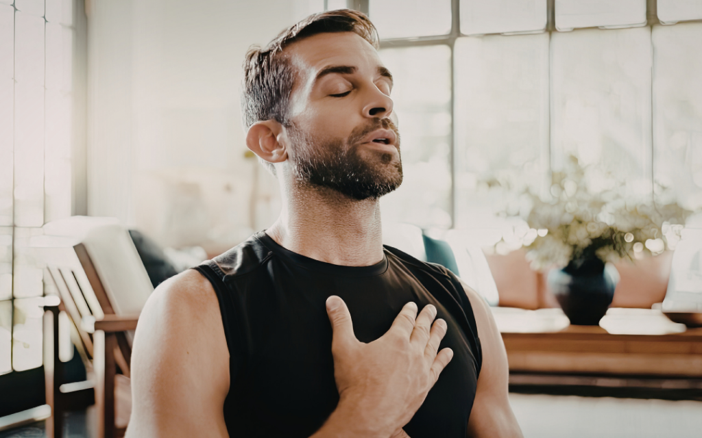 Man taking deep breaths