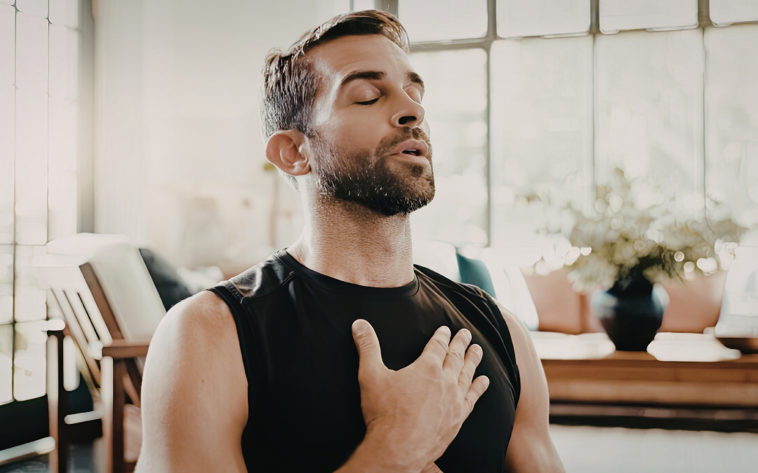 Man taking deep breaths